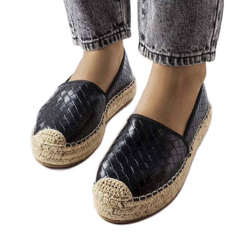 Black espadrilles decorated with Geoffrey embossing